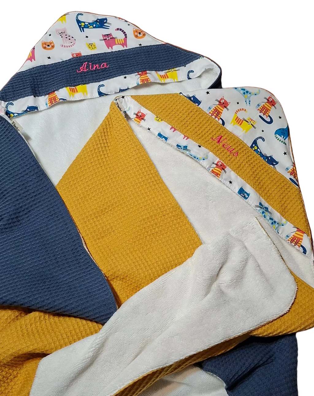 Tovallola amb caputxa